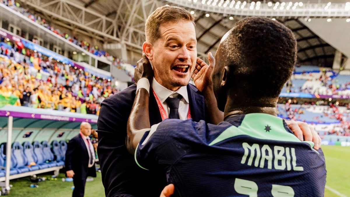 With Awer Mabil after the win, World Cup 2022